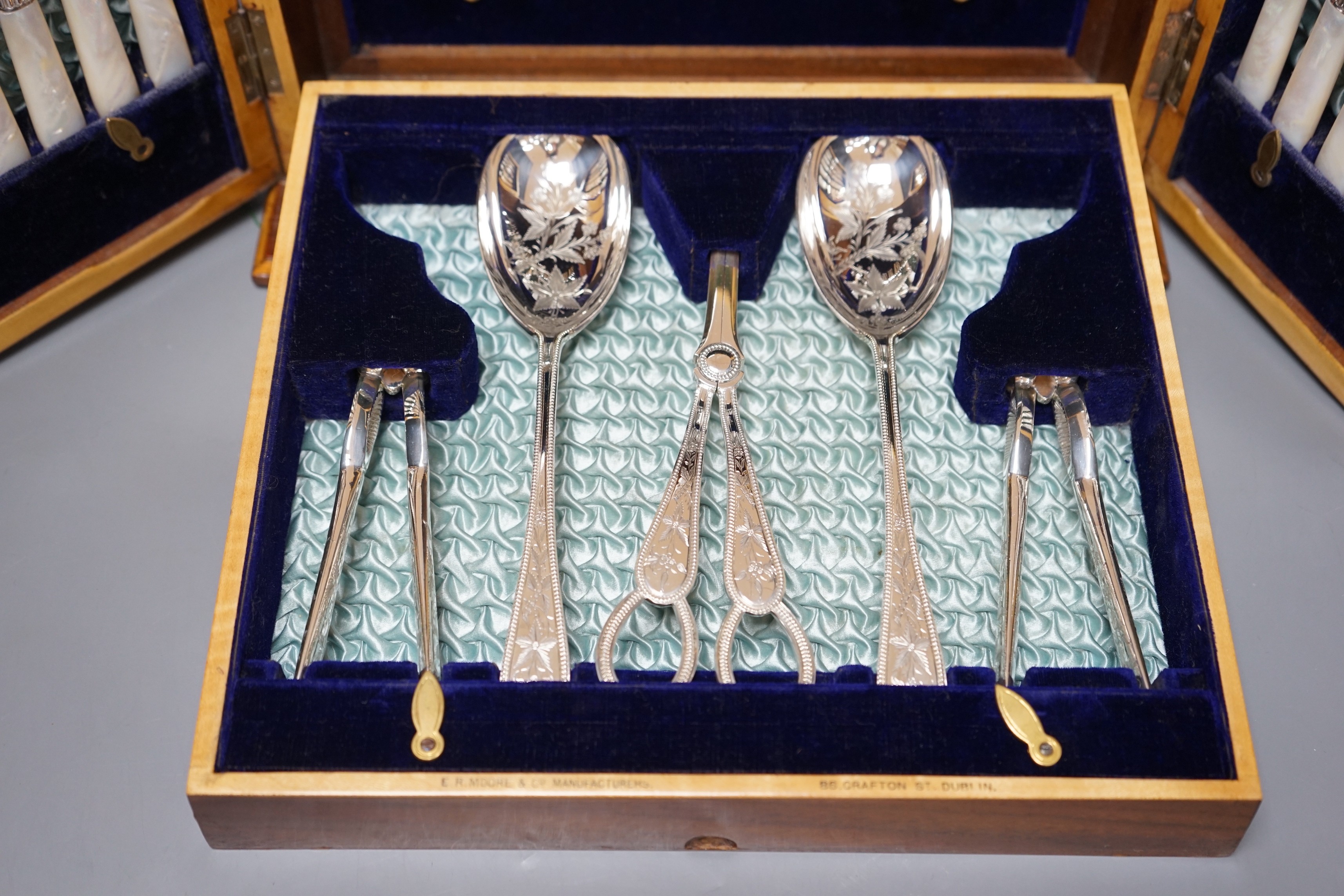 A Victorian plated fruit and nut set in an Irish marquetry inlaid walnut case manufactured by E.R.Moore, Dublin